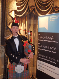 Nigel pipes the Haggis at LBVs Burns' Night